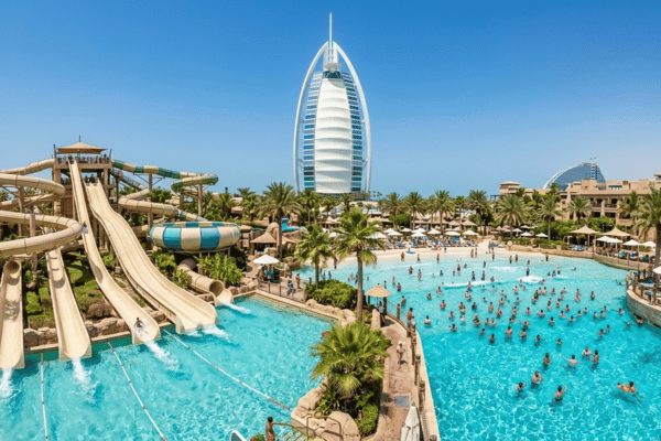 wide angle view of Wild Wadi Waterpark Dubai with Burj Al Arab in background